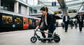 VelociTech Folding Electric Scooter 20-Mile Range - lifestyle commuter scooter persona